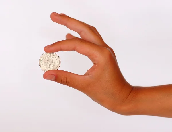 Hand with a coin — Stock Photo, Image