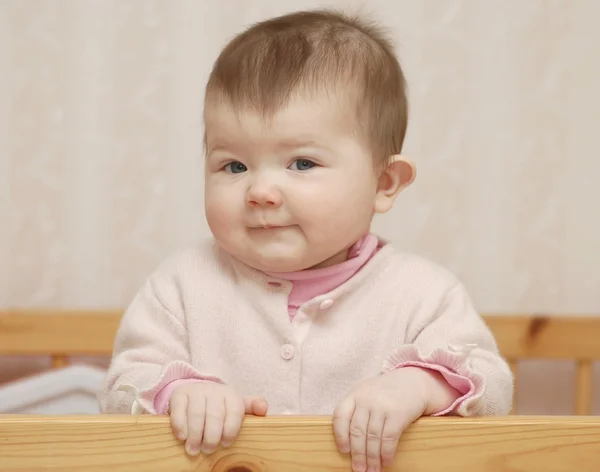 Portrait of baby in bed — Stock Photo, Image