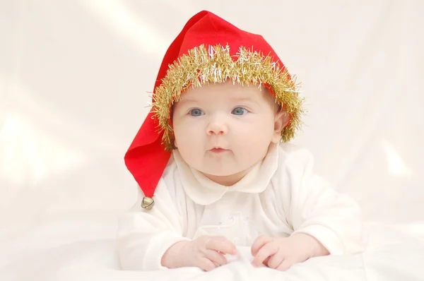 Menina bebê em chapéu vermelho — Fotografia de Stock