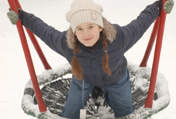 Portrait of beautiful teenage girl on the playground — Stock Photo, Image