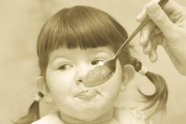 Eating baby — Stock Photo, Image