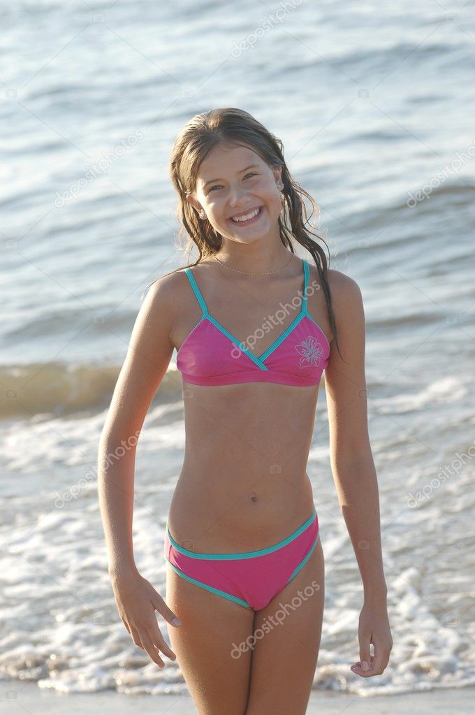 Portrait of beautiful teenage girl on the beach