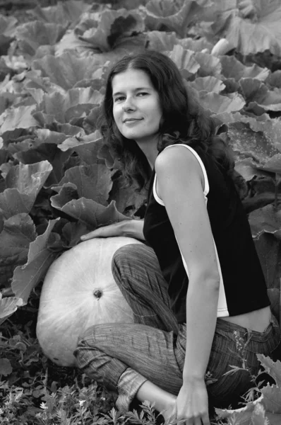 Woman with pumpkin — Stock Photo, Image