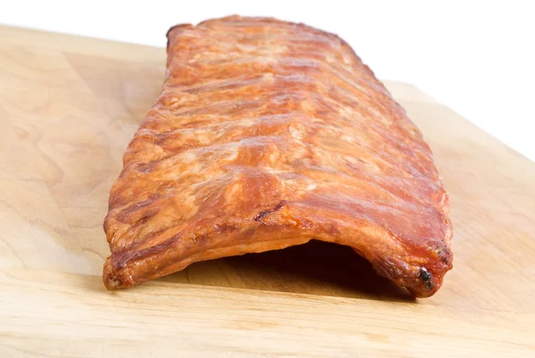 Rack of Smoked Pork Rib on a Cutting Board — Stock Photo, Image