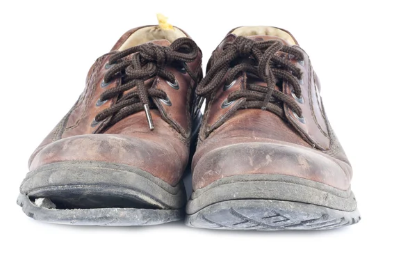 Oude schoenen geïsoleerd op wit — Stockfoto