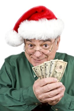Santa ile yumruk üzerinde beyaz izole para dolu