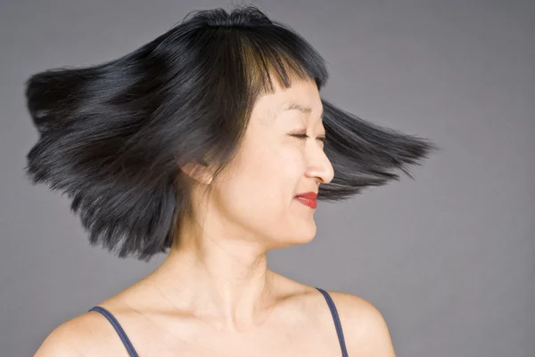 Asian Woman with Short Hair in Motion — Stock Photo, Image