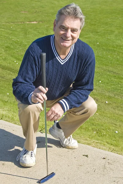 Golfeur avec un putter — Photo