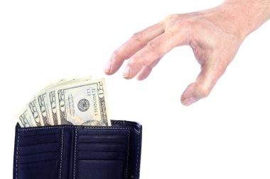 Hand Reaching for Twenty US Dollar Bills clipart
