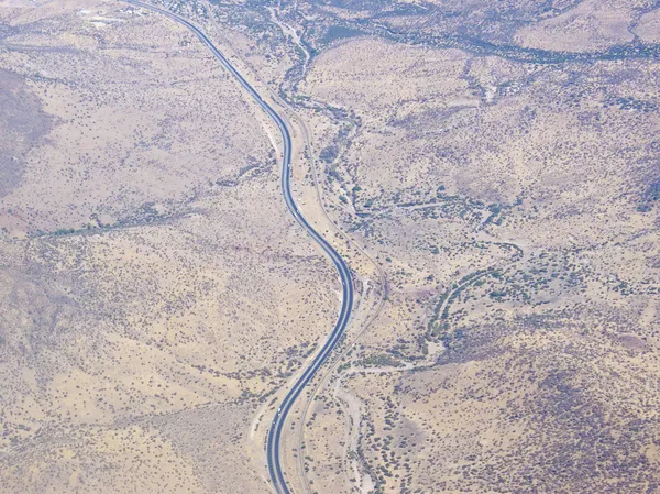 Aerial View of a Road Winding Through the Valley — Stock Photo, Image