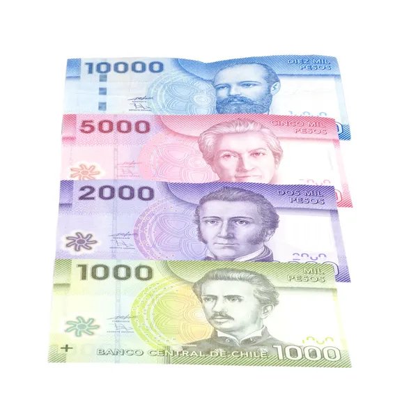 Çeşitli mezheplerin üzerinde beyaz izole renkli Şili peso — Stok fotoğraf