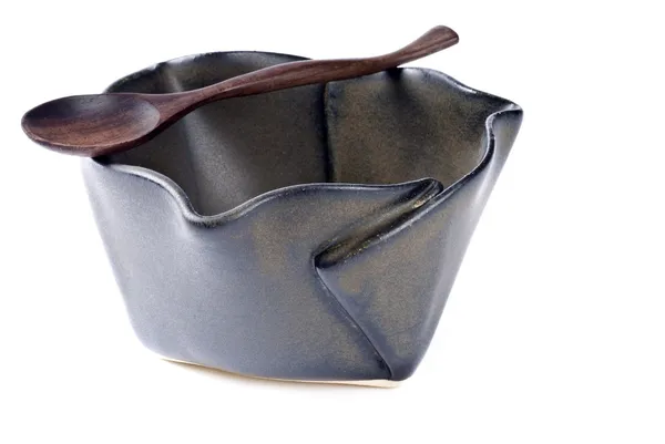 Taça de cerâmica com colher de madeira — Fotografia de Stock