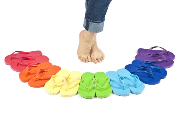Flip flops in kleuren van de regenboog geïsoleerd op wit — Stockfoto