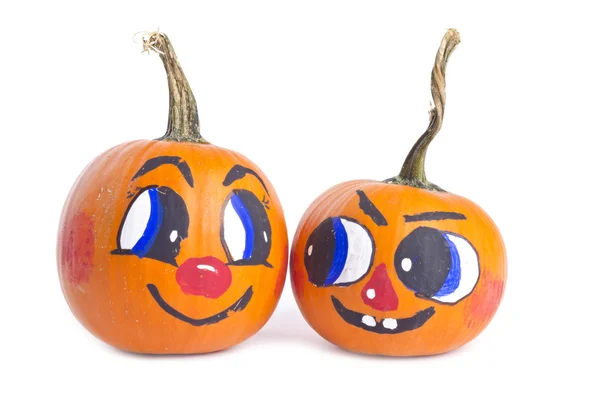 Citrouilles décoratives avec des visages souriants — Photo