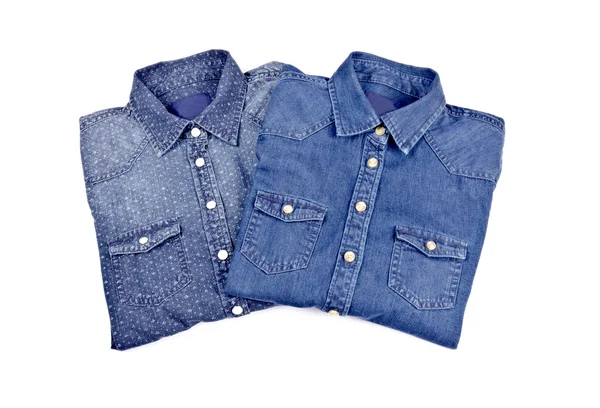 Camisas de ganga dobradas azuis femininas — Fotografia de Stock