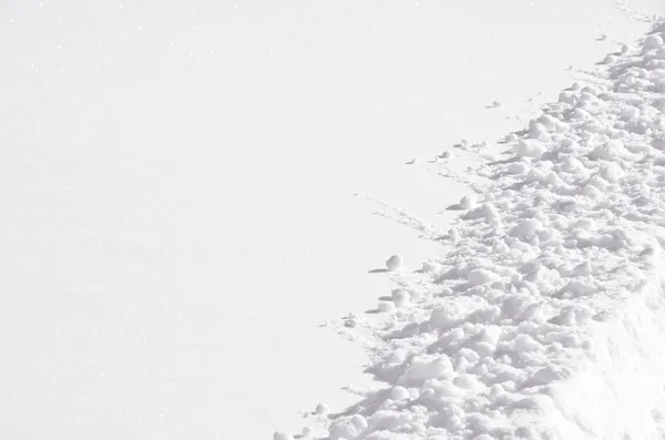 Шаблоны и текстуры в снегу — стоковое фото