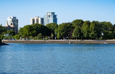 Port Credit Waterfront Lined with Trees and Condominiums and Apartment Buildings