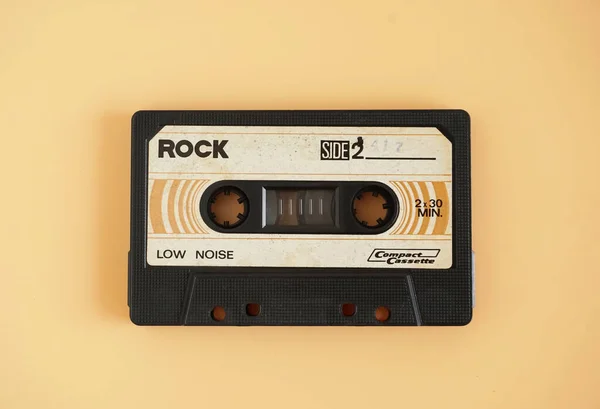 Audio Cassette Tape Isolated Orange Background Vintage Retro Gadgets — Stock Photo, Image