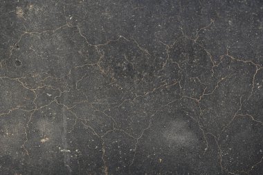 Paslı ve soyut metal yüzey dokusunun fotoğrafı. Demir yüzey, çizikli metal. Gri ve altın rengi. Grunge Biçimi