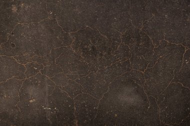 Paslı ve soyut metal yüzey dokusunun fotoğrafı. Demir yüzey, çizikli metal. Altın, bronz, kahverengi. Grunge Biçimi