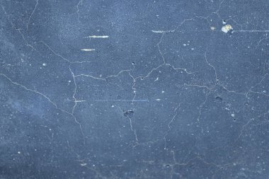 Paslı ve soyut metal yüzey dokusunun fotoğrafı. Demir yüzey, çizikli metal. Mavi ve beyaz. Grunge Biçimi