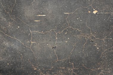 Paslı ve soyut metal yüzey dokusunun fotoğrafı. Demir yüzey, çizikli metal. Gri ve kahverengi, altın, sarı renk. Grunge Biçimi