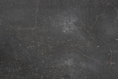 Paslı ve soyut metal yüzey dokusunun fotoğrafı. Demir yüzey, çizikli metal. Gri ve altın, kahverengi, renk. Grunge Biçimi