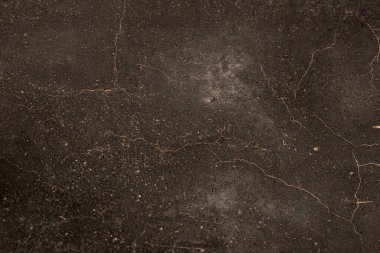 Paslı ve soyut metal yüzey dokusunun fotoğrafı. Demir yüzey, çizikli metal. Bronz, kahverengi renk. Grunge Biçimi