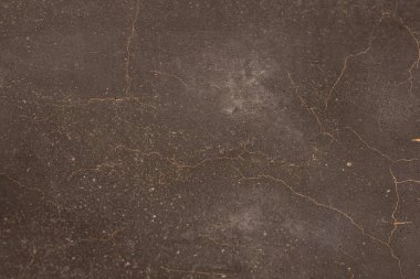 Paslı ve soyut metal yüzey dokusunun fotoğrafı. Demir yüzey, çizikli metal. Bronz, kahverengi renk. Grunge Biçimi