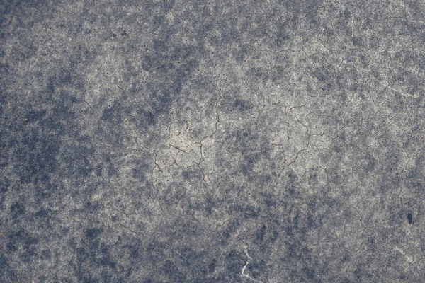 Paslı ve soyut metal yüzey dokusunun fotoğrafı. Demir yüzey, çizikli metal. Mavi renk. Grunge tarzı