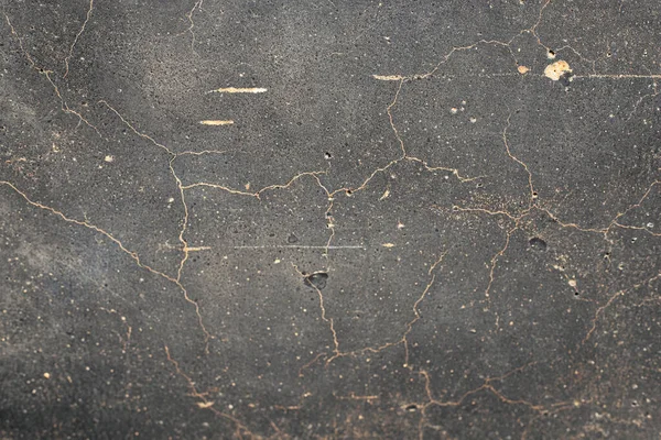 Paslı ve soyut metal yüzey dokusunun fotoğrafı. Demir yüzey, çizikli metal. Gri ve kahverengi, altın, sarı renk. Grunge Biçimi