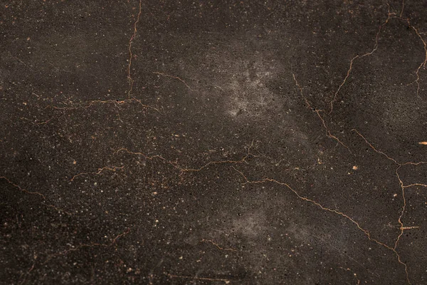 Paslı ve soyut metal yüzey dokusunun fotoğrafı. Demir yüzey, çizikli metal. Bronz, kahverengi renk. Grunge Biçimi