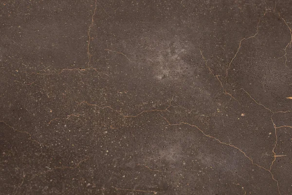 Paslı ve soyut metal yüzey dokusunun fotoğrafı. Demir yüzey, çizikli metal. Bronz, kahverengi renk. Grunge Biçimi