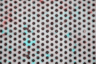 Geometrik ızgara şeklinde metalik bir yüzeyin fotoğrafı. Bulanık effec ile metal paslı yüzey