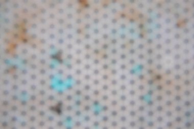 Geometrik ızgara şeklinde metalik bir yüzeyin fotoğrafı. Bulanık effec ile metal paslı yüzey