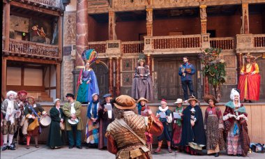 Performers in traditional costume in Shakespeare's Globe Theatre