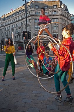 A circus themed fashion shoot at Oxford Circus. clipart