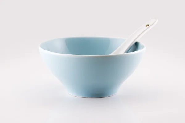 Bowl and spoon — Stock Photo, Image