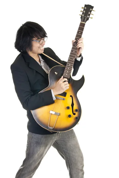 Asiatisk ung musiker spiller guitar - Stock-foto