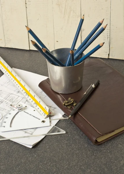 Tools and papers with sketches — Stock Photo, Image