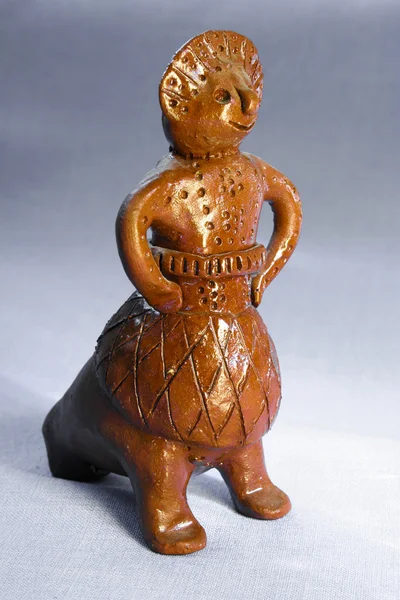 Traditional clay toy whistle woman in a sundress — Stock Photo, Image