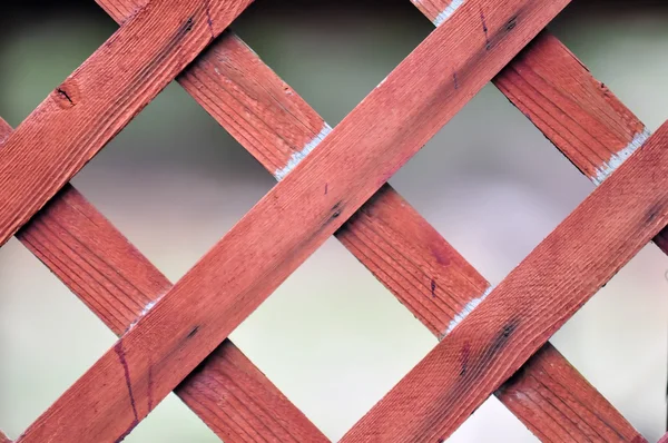 Red lattice fence detail — Stock Photo, Image