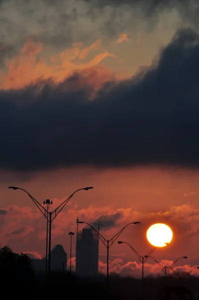 Dramatic sunrise over city — Stock Photo, Image