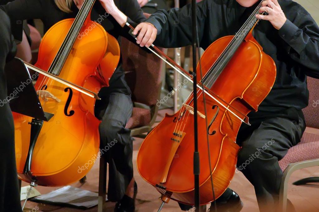 Students playing on bass instrument — Stock Photo © digidream 22999940