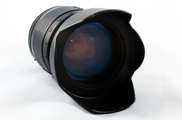 Close up van de lens van de camera op een witte achtergrond — Stockfoto