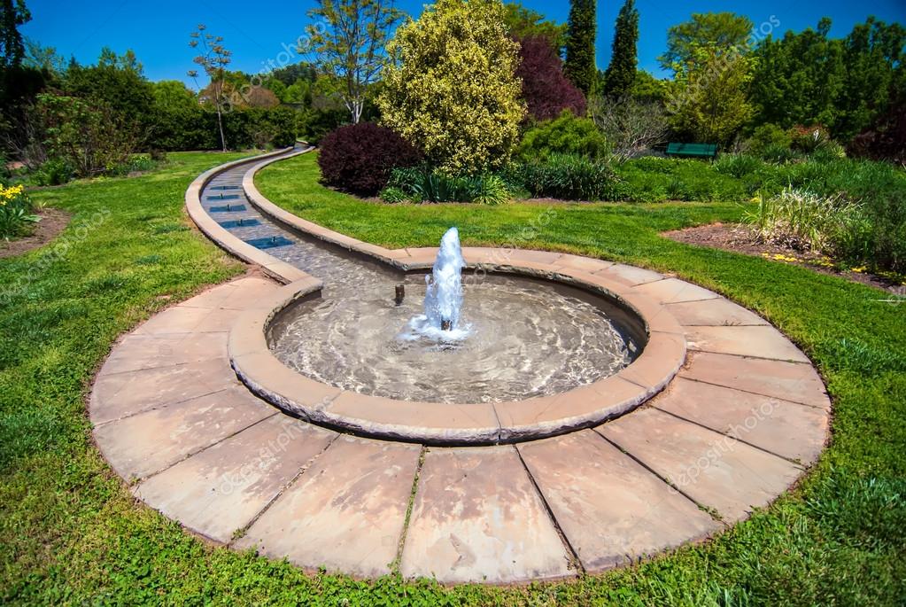 Fountain in botanical garden — Stock Photo © digidream 24826089
