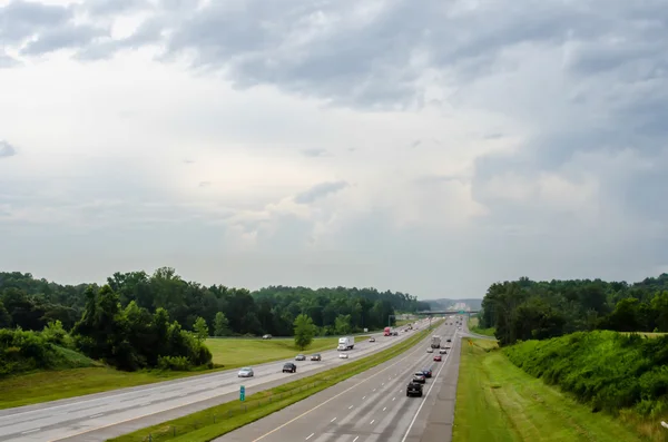 Highway traffic near a big city — Stock Photo, Image