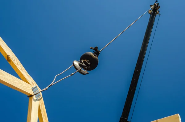 Construction crane at a job site — Stock Photo, Image