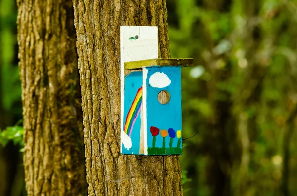 Bird house with a rainbow colors — Stock Photo, Image