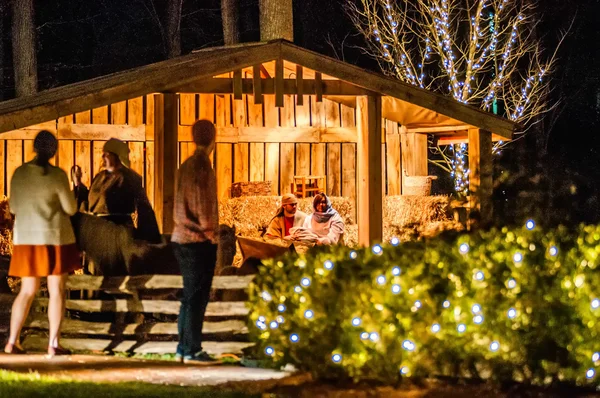 Visitors viewing live nativity play during christmas — Stock Photo, Image